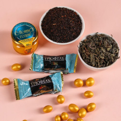 Подарочный набор «Время чудес»: чай чёрный 20 г., арахис в белой шоколадной глазури 70 г., трюфель 100 г., крем-мёд с апельсином 30 г. - фото